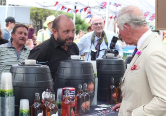 Prince Charles inspecting a local brew
